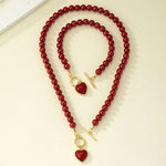 Load image into Gallery viewer, Electroplating Pearl Bracelet Necklace Set Alloy Creative Love Pendant Necklace Set Light Luxury Fashion Love Collarbone Chain