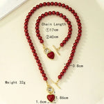 Load image into Gallery viewer, Electroplating Pearl Bracelet Necklace Set Alloy Creative Love Pendant Necklace Set Light Luxury Fashion Love Collarbone Chain