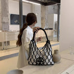 Load image into Gallery viewer, Seasonal Hollow Out Designed Shoulder Bag Versatile Knitting Handle Bag England Style Casual Women Tote Underarm Bag