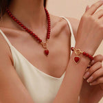 Load image into Gallery viewer, 2-piece fashion red imitation pearl bracelet necklace set Mother's Day gift/women's niche high-end luxury style love cla