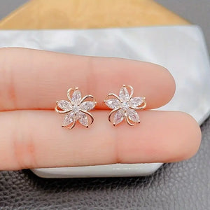 Mosaic Material:Synthetic Zircon (synthetic Cubic Zirconia) Ear Needle Material:925 Sterling Silver Plating: Silver Plated The Main Material: Copper Style: Luxury Is It Feather?: No Occasion: Daily Occasion,Banquet Occasion Seasoon: Summer Holiday: None