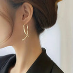 Load image into Gallery viewer, Elegant And Minimalist Long Curved Cross Earrings
