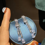 Load image into Gallery viewer, Huitan Shining Dangling Earrings Female Wedding Jewelry Silver Color Bright Drop-shaped Zirconia Pendant Accessories for Party
