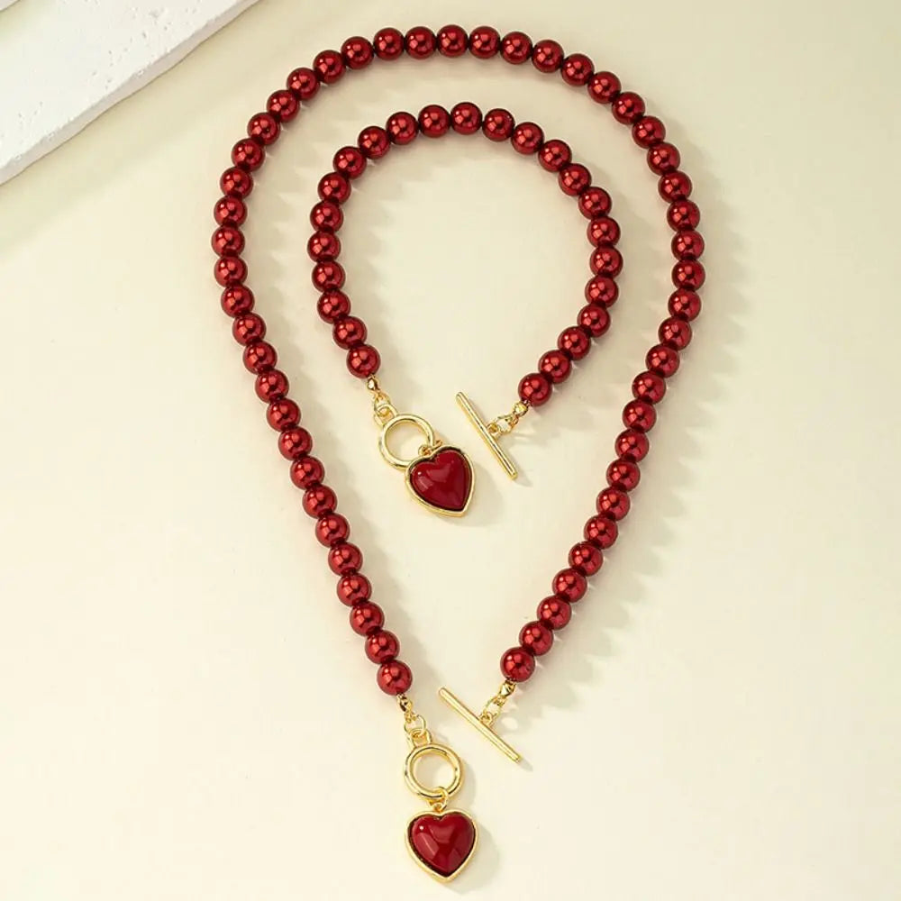 Electroplating pearl bracelet necklace set alloy creative love pendant necklace set light luxury fashion love collarbone chain