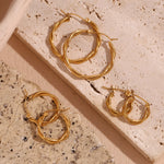 Load image into Gallery viewer, E.B.belle Thin Twists Ring Hoop Earrings Water Resistant 316L Stainless Steel Women's Earrings 18K Gold Plated Jewelry
