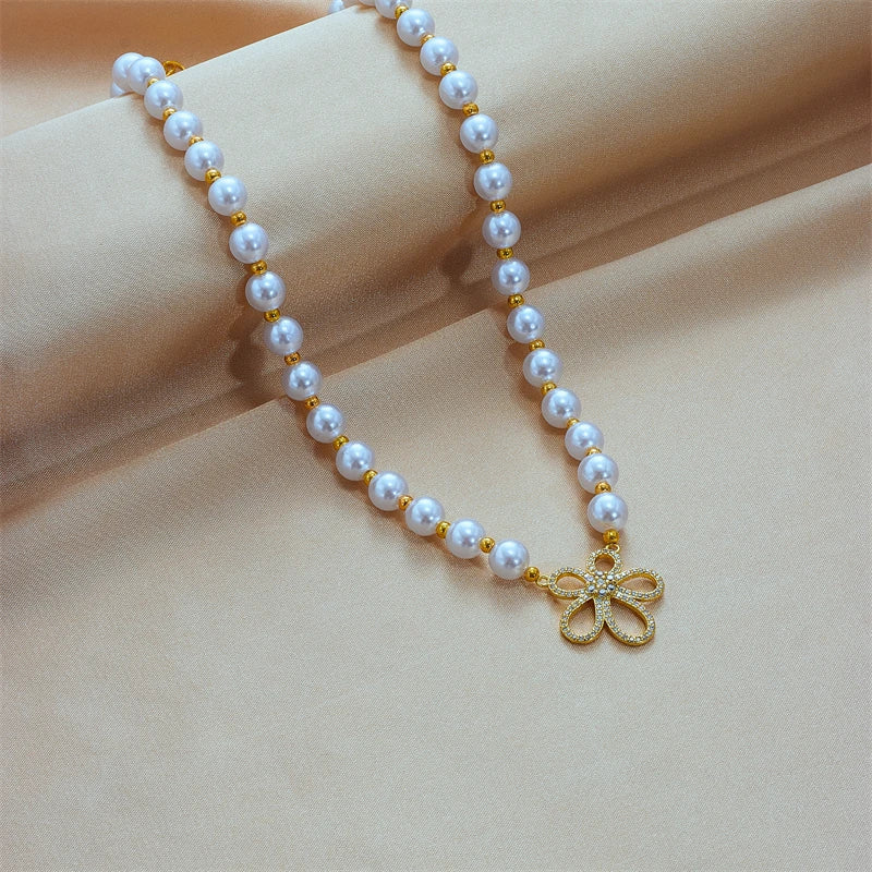 XIYANIKE 316L Stainless Steel Necklace for Women Pearl Gold Color Hollow Flowers Pendant Charming Exquisite Chic Jewelry Gifts