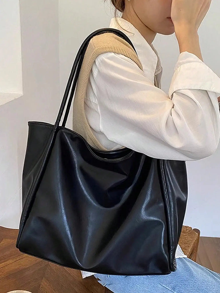 2024 new soft leather large capacity tote bag with a niche design for handheld use, single shoulder underarm bag for class and c