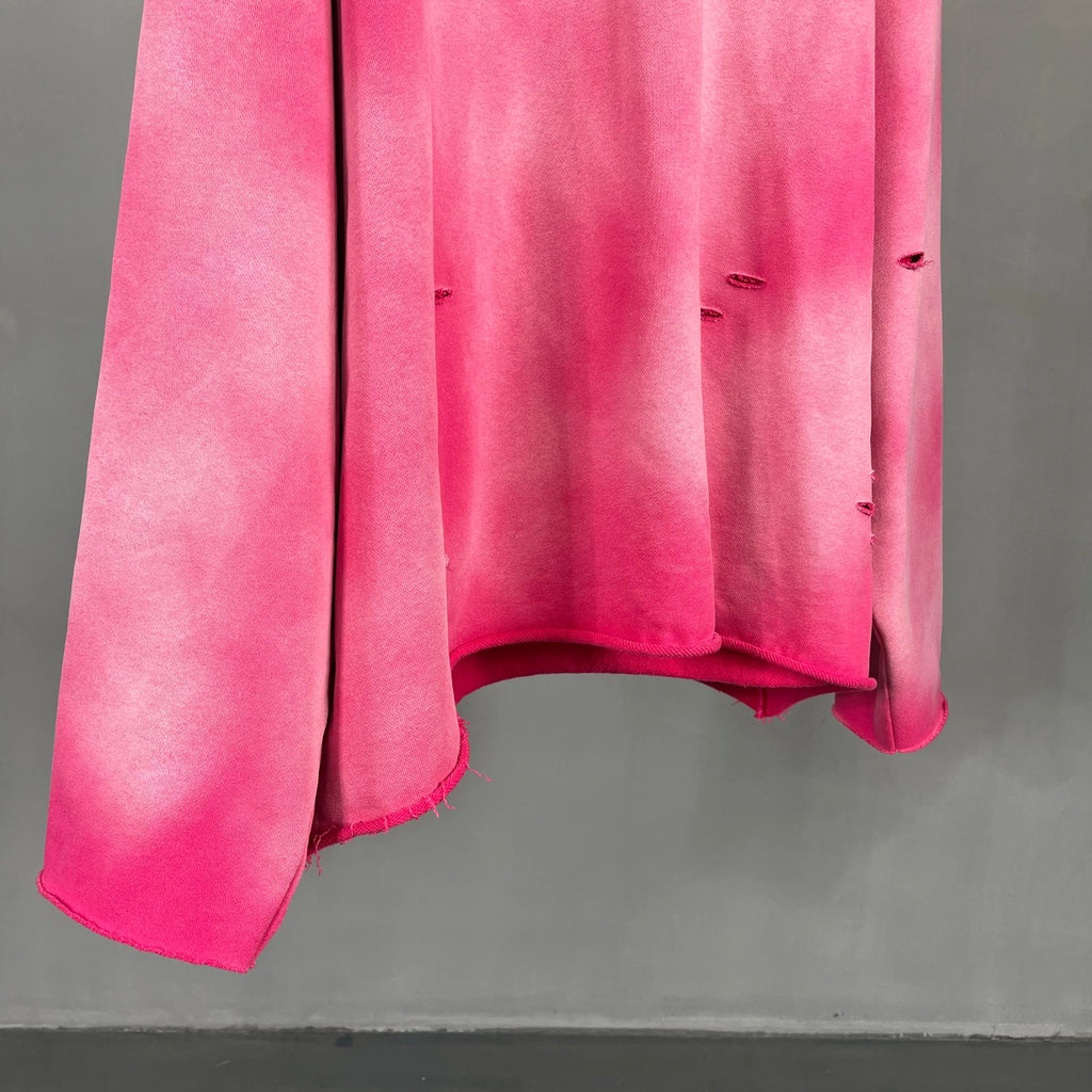 Irregular holes in the raw edge of the old wash water spray monkey hair hoodie