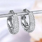 Load image into Gallery viewer, Huitan Hollow Gold Color Hoop Earrings for Women Paved Dazzling CZ Stone Luxury Trendy Female Circle Earrings Statement Jewelry
